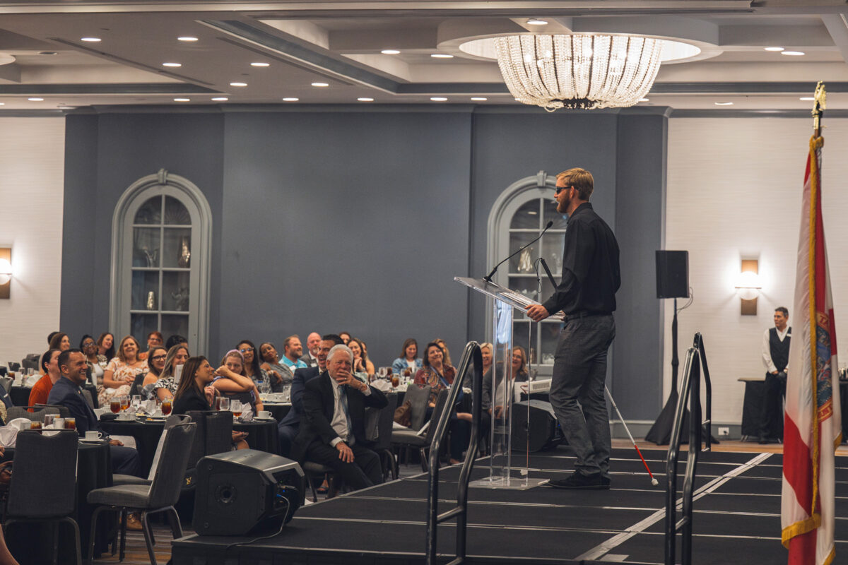Jake Olson speaks to a crowd of nearly 200 NEFAR members at the Annual Fall Business Meeting on 9/20/24.