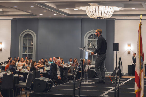 Jake Olson speaks to a crowd of nearly 200 NEFAR members at the Annual Fall Business Meeting on 9/20/24.