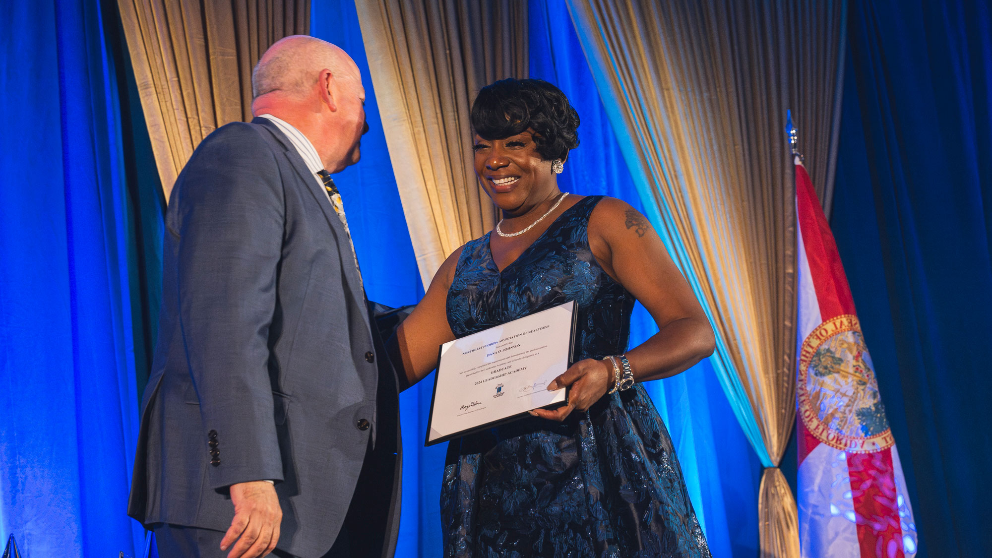 Woman receives certificate for Class of 2024 Leadership Graduation