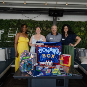 Council Members with Donation Items