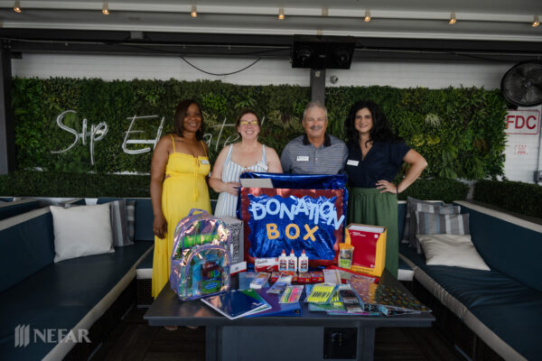 Council Members with Donation Items