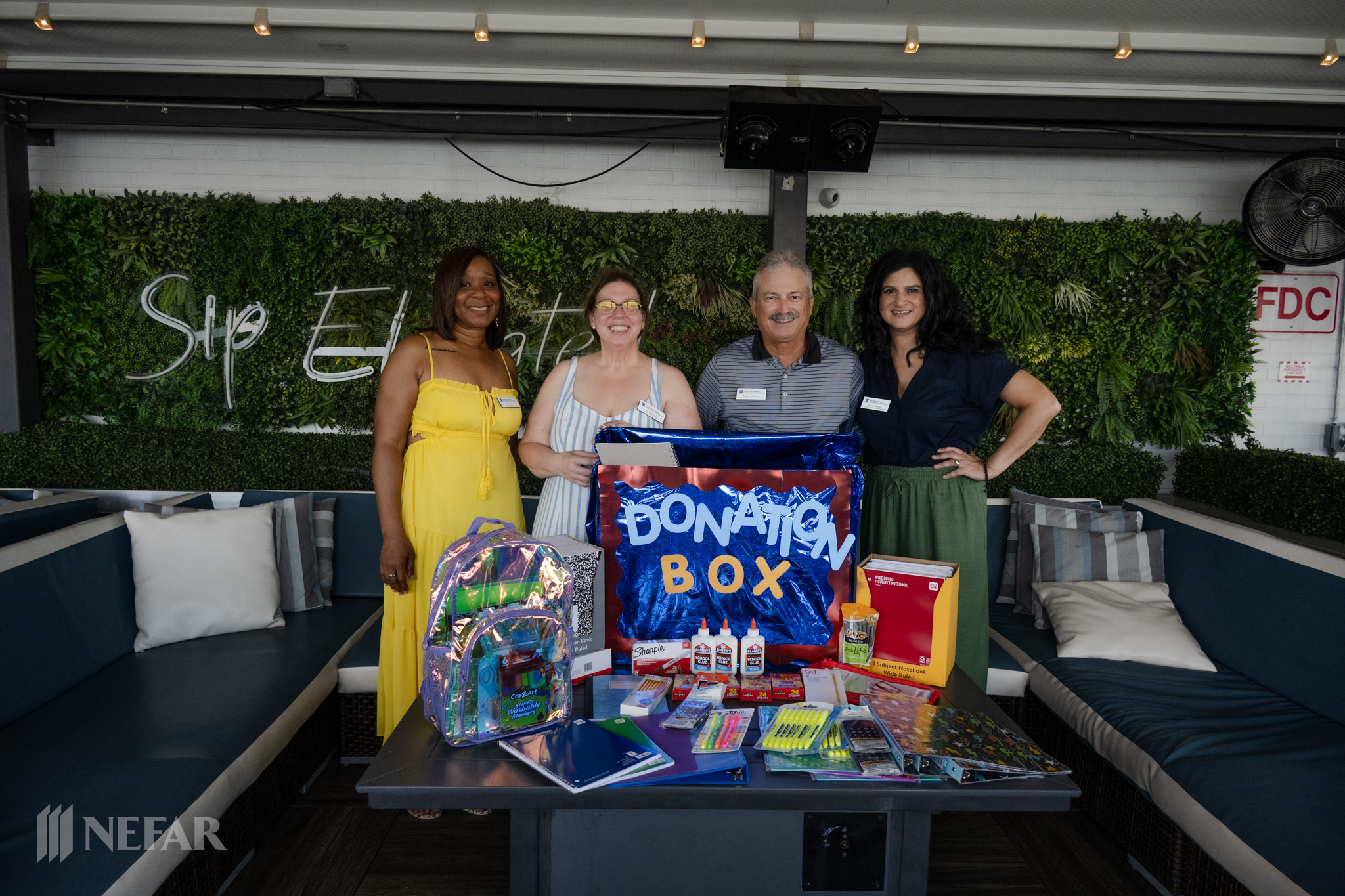Council Members with Donation Items