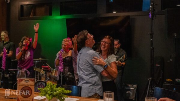 members dancing while the band plays